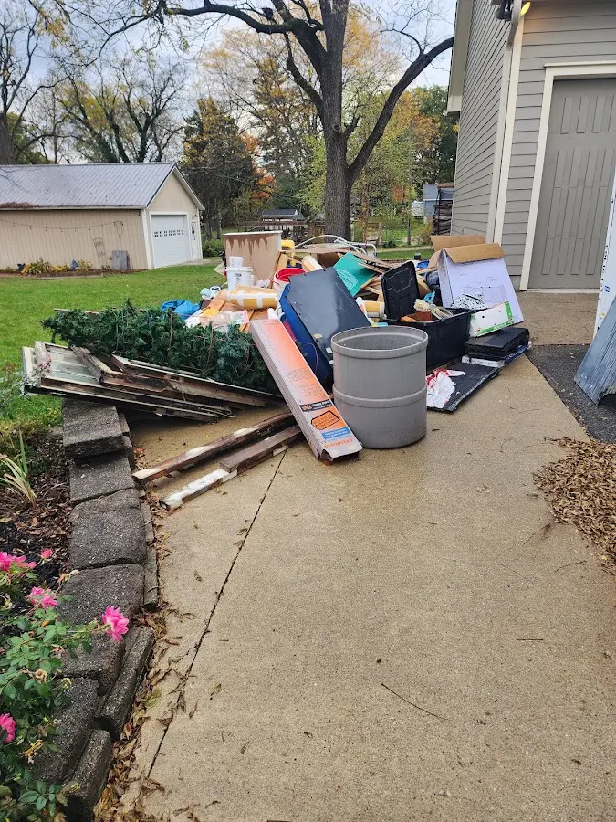 Dumpster being loaded with debris for 30 Yard Dumpster Rental in Seattle